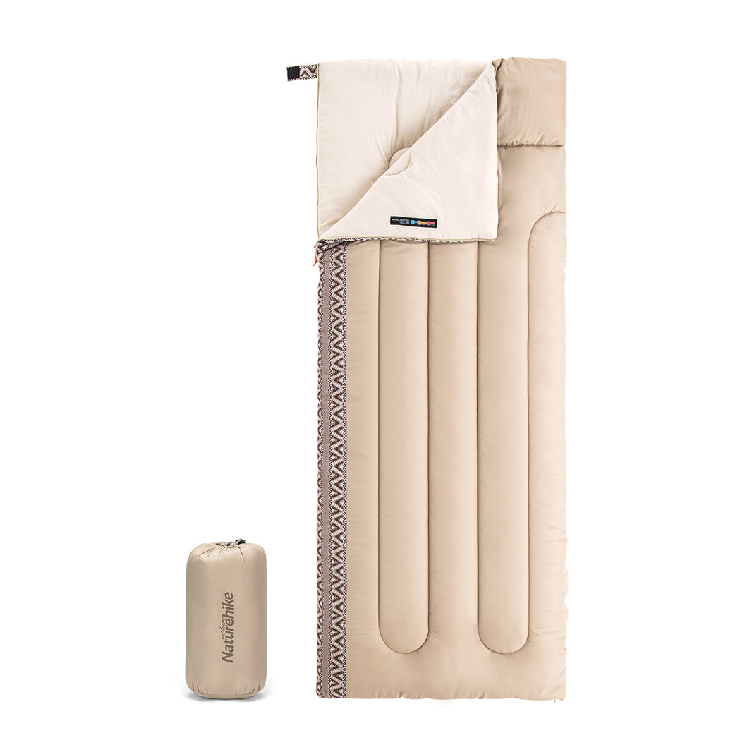 A beige Naturehike L150 sleeping bag displayed open with its inner lining visible, alongside a compression sack.