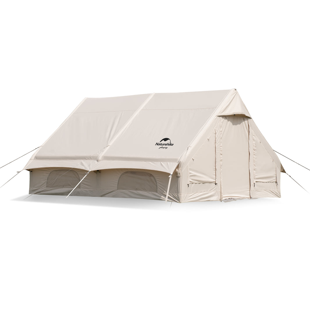 Khaki inflatable tent with a solid white interior, featuring a zipper and window or door, set up outdoors.