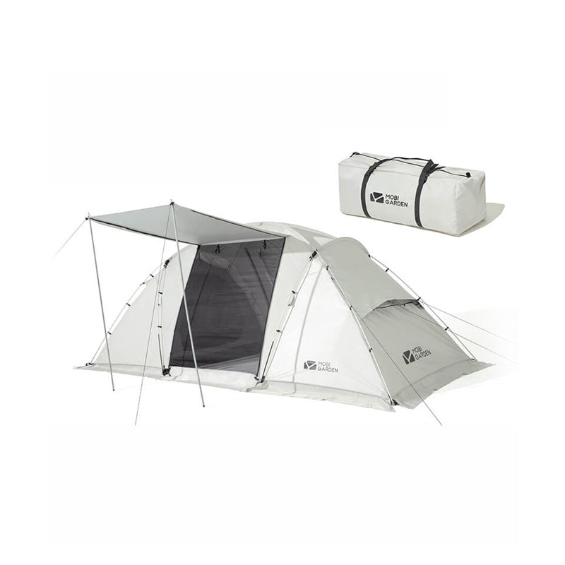 A white Mobi Garden tunnel tent set up with an extended vestibule, displayed alongside its carrying bag.