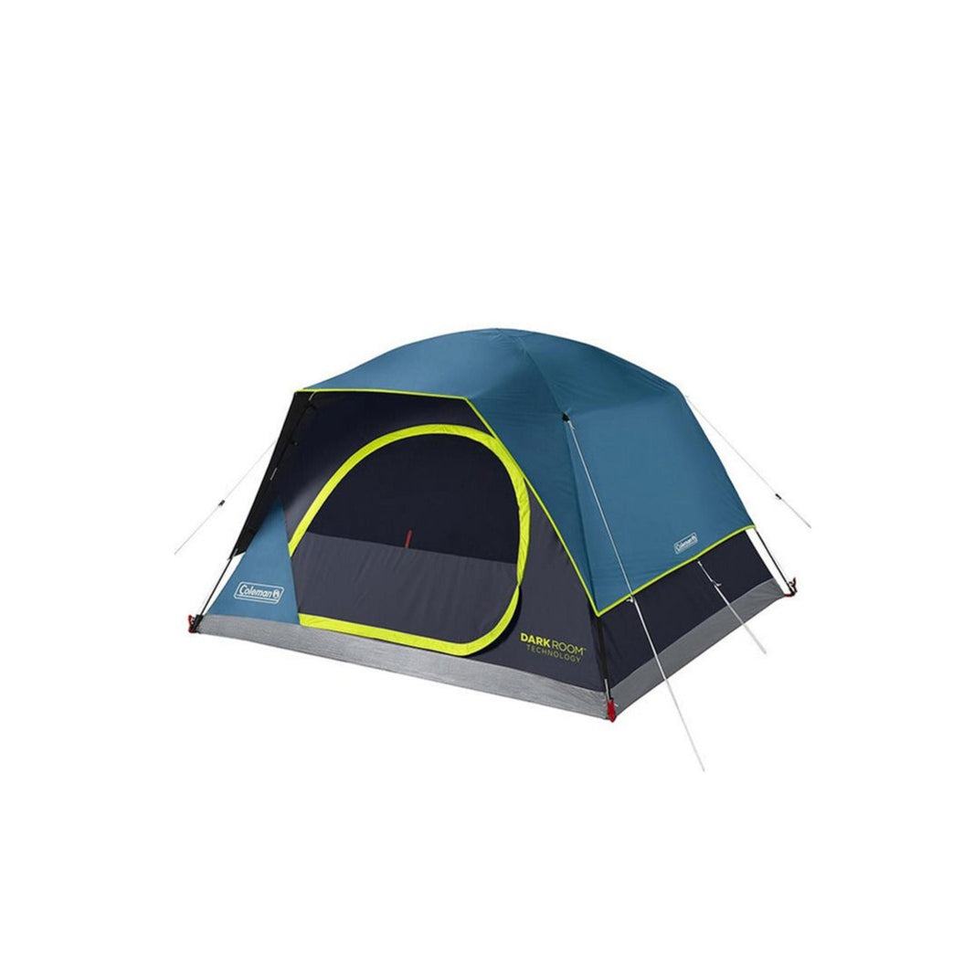 A blue and green Coleman 4-Person Skydome Darkroom Tent with a wide door and mesh storage pockets.