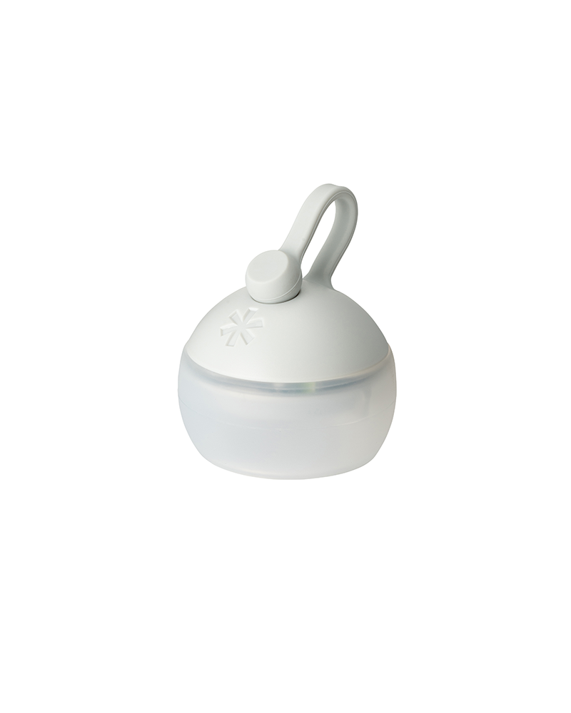 Snow Peak Mini Hozuki ES-141 lantern in Morning Mist ivory, silicone hanging loop up, studio white background