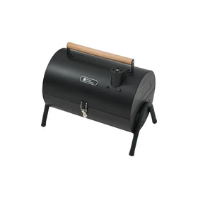 A compact, black two-sided barbecue stove with a wooden handle, designed for outdoor cooking activities like camping and picnics.