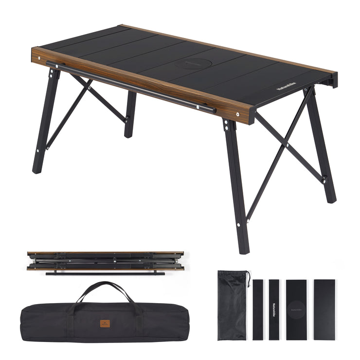 A foldable camping table with a black tabletop and aluminum frame, shown both assembled and folded, including a carrying case.