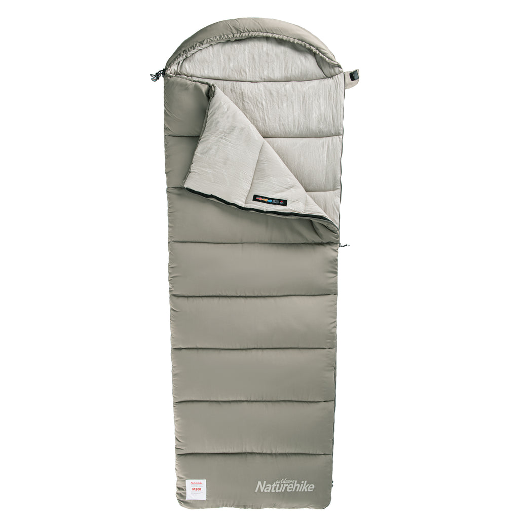 A green rectangular sleeping bag with a hat attached at the top, branded 'Naturehike'.