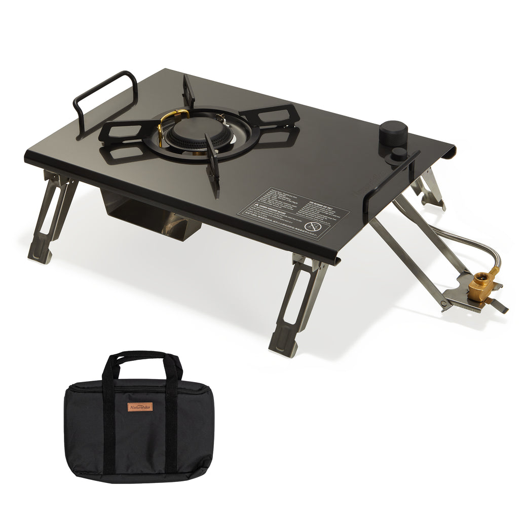 A black Naturehike G01 tabletop folding single head gas furnace with a stainless steel body, displayed alongside its carrying case.