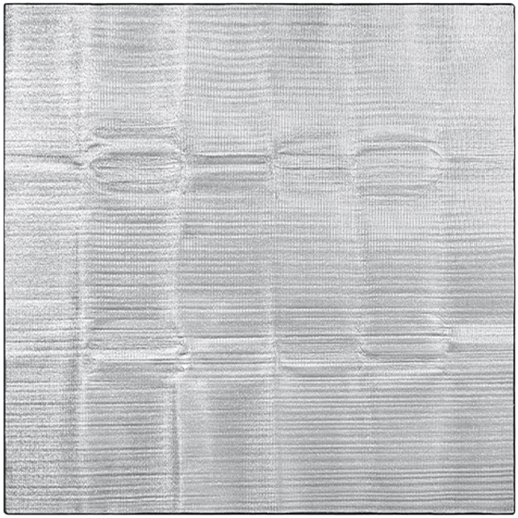 A silver-colored sleeping pad with an aluminum coating designed for outdoor use.