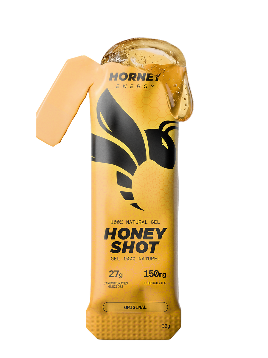 Hornet Energy Honey Shot energy gel sachet in Original flavour, 33 g, showing 27 g carbohydrates and 150 mg electrolytes.