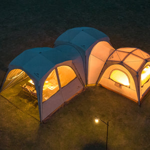 Two connected tents with warm lighting on a dark outdoor setting, labeled 'DIY Ultimated Connectivity'.