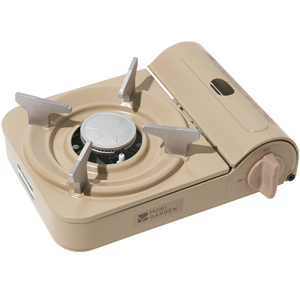 A portable gas stove in beige color with a visible brand logo on the front.