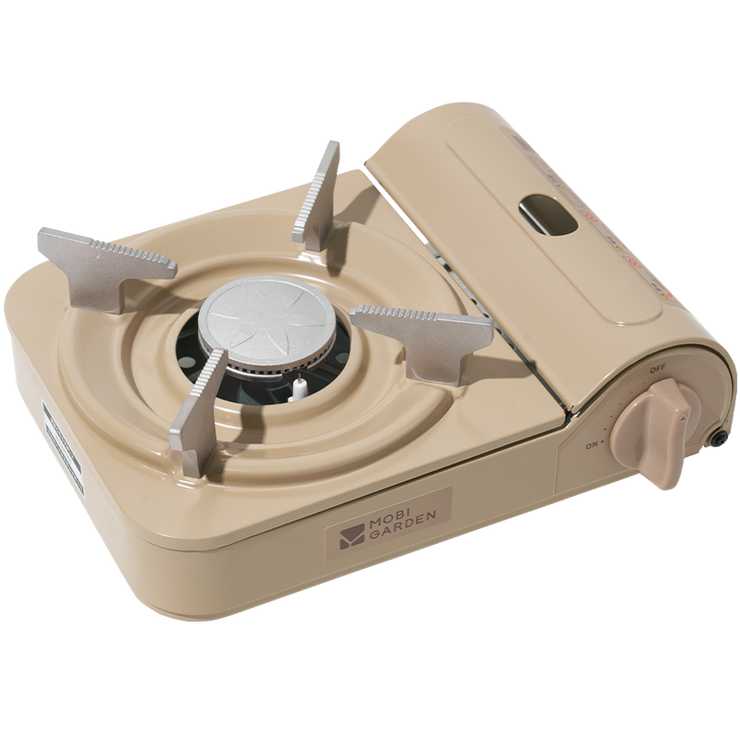 A portable gas stove in beige color with a visible brand logo on the front.