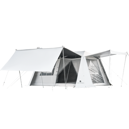 Large white cabin tent with a visible zipper entrance and a black coated exterior, set up outdoors.