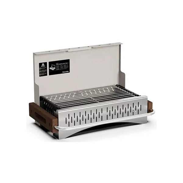 A beige Naturehike Moyan tabletop travel BBQ grill with wooden handles and a foldable metal grate.