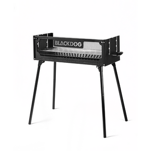 A black BLACKDOG outdoor folding grill with a closed lid, displayed on a white background.