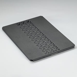A black aluminum top board with a geometric pattern, designed for use with IGT grill tables and bridge tables.