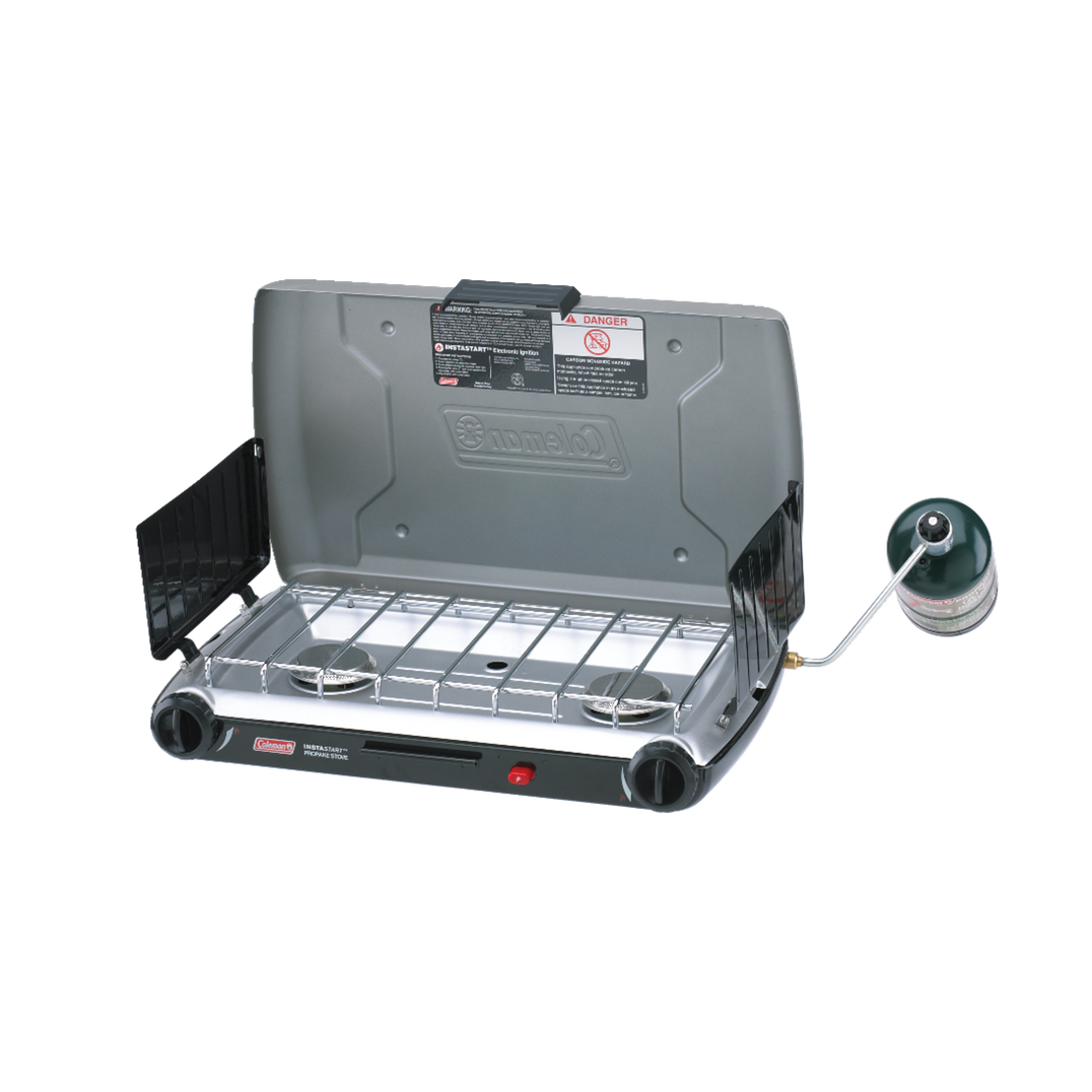 Coleman 2 Burner Triton Series Stove, open, with two burners and a windscreen.