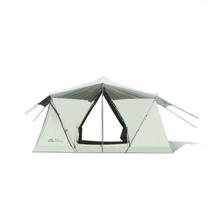 A green double-layered tent with a sunshade on top and visible mesh doors.
