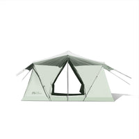 A green double-layered tent with a sunshade on top and visible mesh doors.
