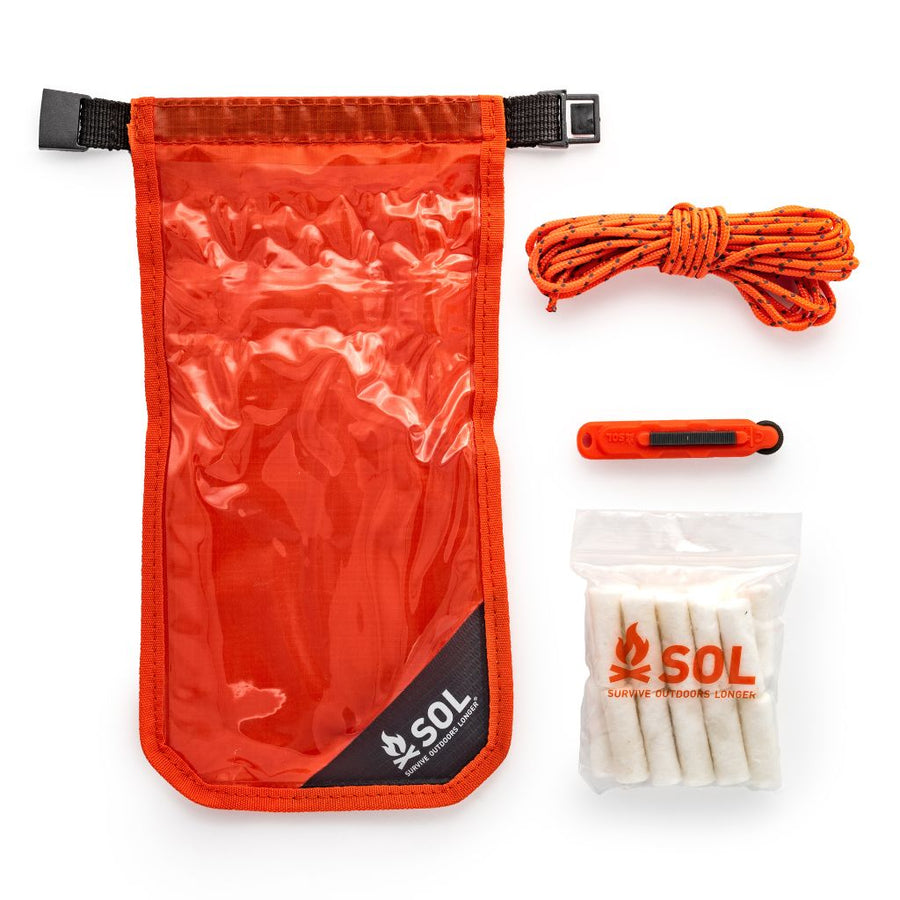 SOL Fire Lite Kit contents: micro sparker, Tinder Quik, tinder cord and waterproof dry bag