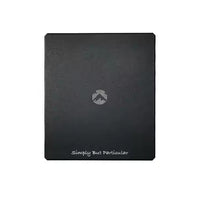 A matte black anodized aluminum camping table with a simple design and a logo in the center that reads 'Camping Moon'. The table is flat and appears sturdy with a slight texture.