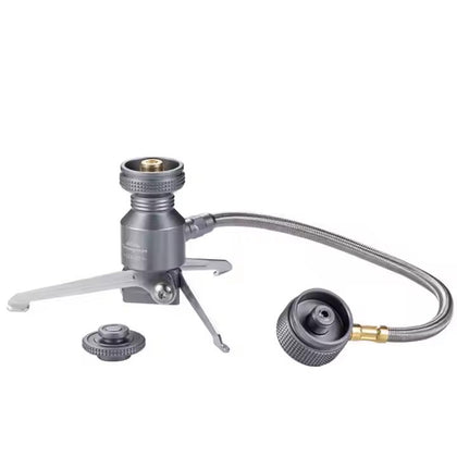 CampingMoon Remote Adapter Z23-OD, consisting of a gas stove connector with a self-sealing valve, a stainless braided hose, and additional components, displayed on a white background.