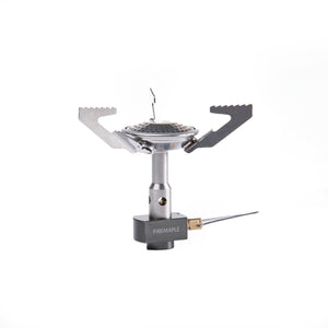 A Fire Maple Buzz Gas Stove with a silver finish, featuring a foldable design and a wind guard.