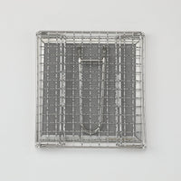 Flat-folded Campingmoon toaster showing its slim, compact storage form