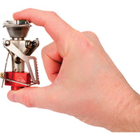 Person holding folded MSR PocketRocket 2 to demonstrate its ultralight size