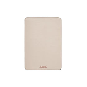 A beige, square-shaped self-inflating sleeping pad with the Naturehike brand logo visible.