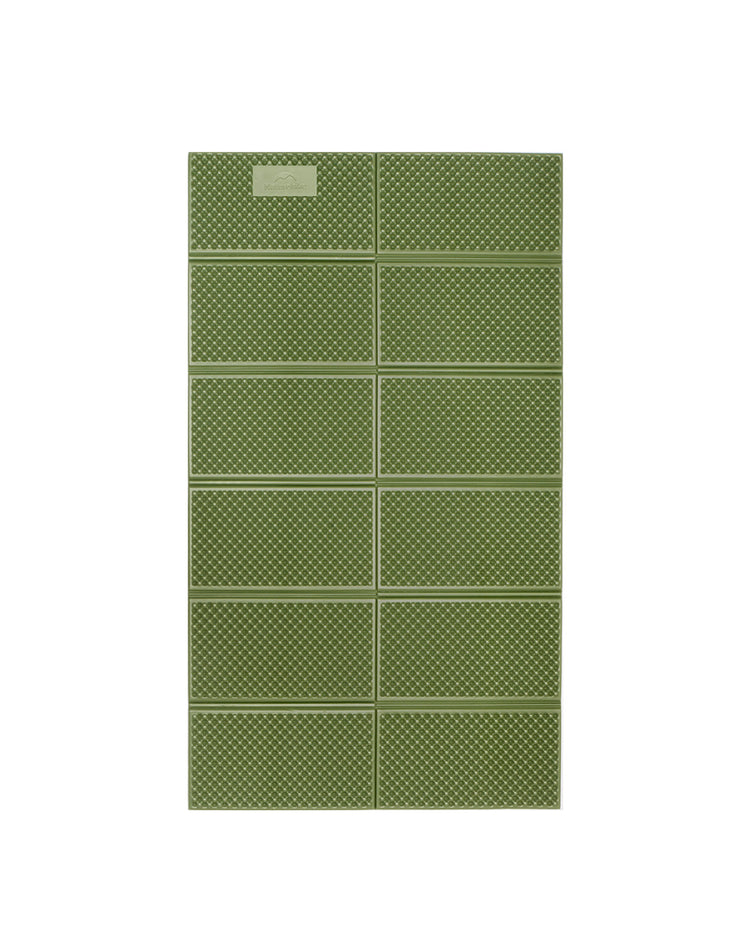A green folding mat with a geometric pattern, designed for outdoor use.