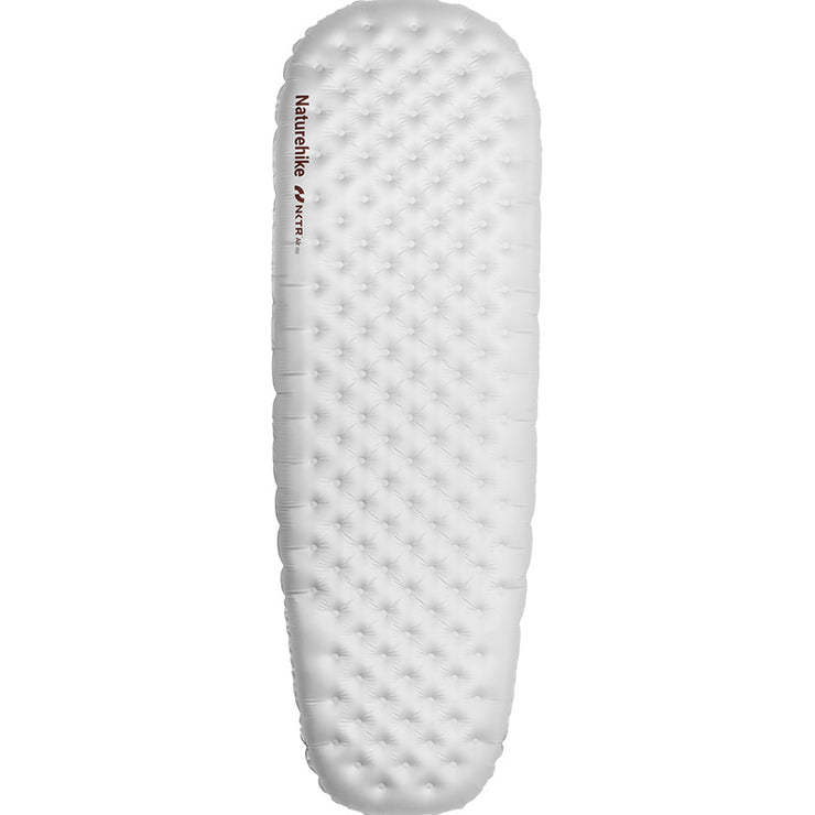 An inflatable mummy sleeping pad with a textured surface, primarily white in color.