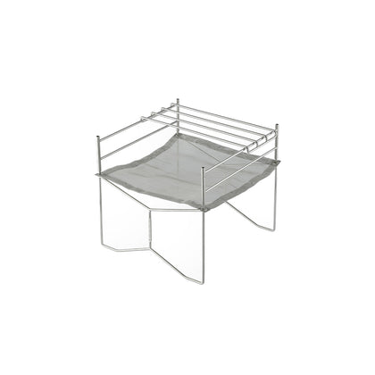 A portable silver camping grill set with a mesh grid and metal frame.