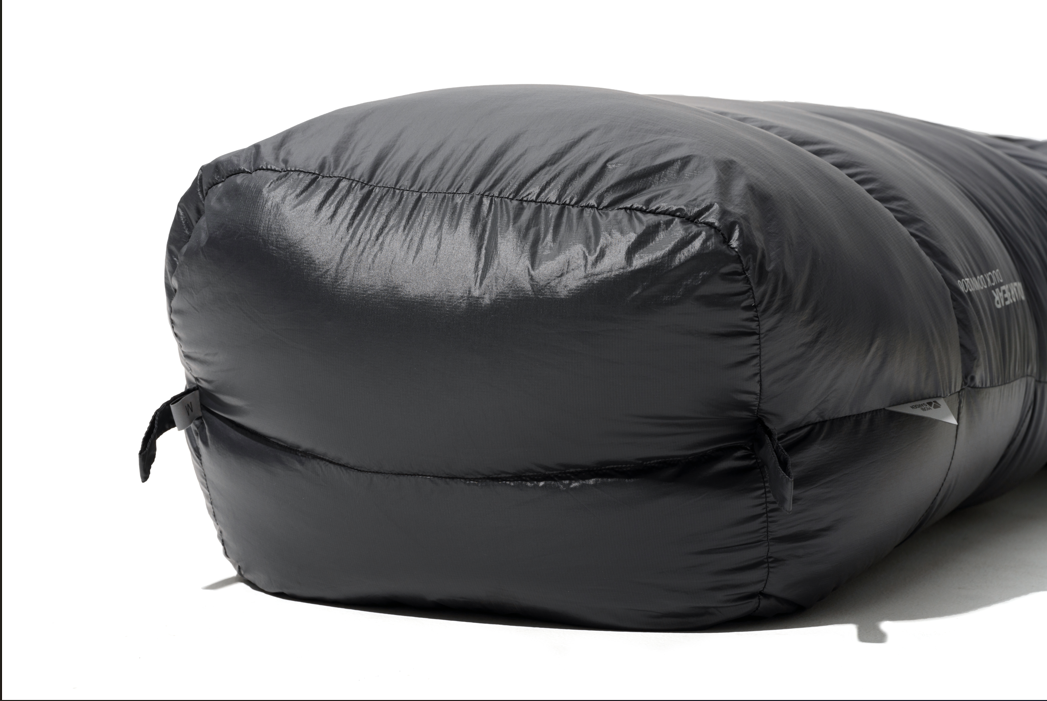 Black sleeping bag on a white background