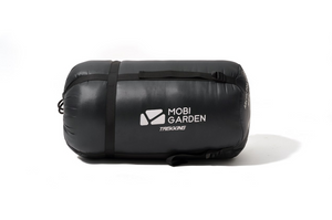Black compression bag with Mobi Garden logo on a white background
