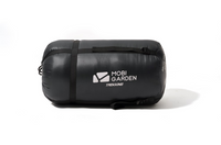 Black compression bag with Mobi Garden logo on a white background