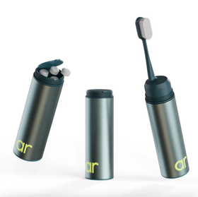Adventure Ready Tooth Care Capsule shown three ways: open with tablets, closed, and with the folding toothbrush extended.
