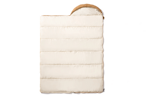 White quilted baby carrier with brown handle on a white background