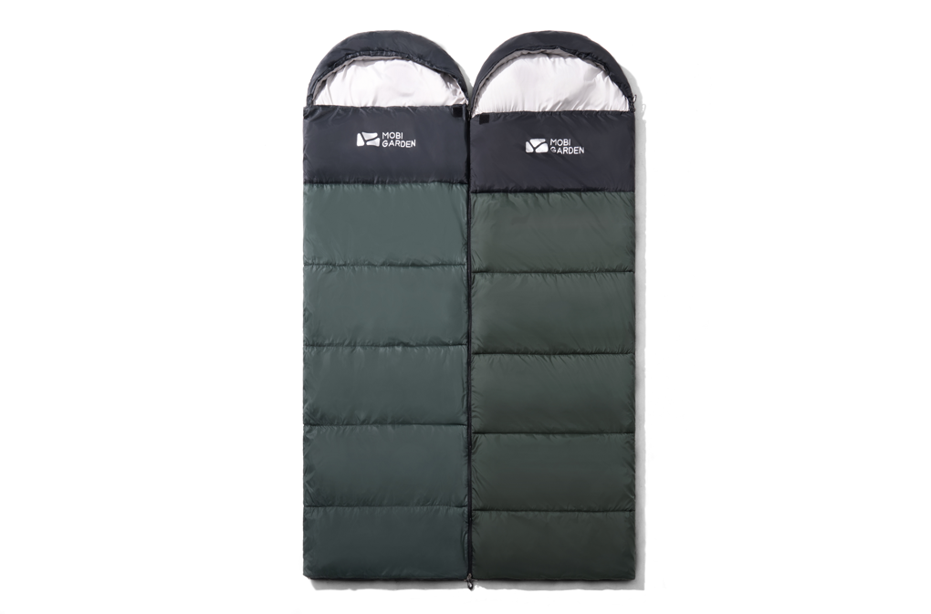 Two green sleeping bags with a brand logo on a white background