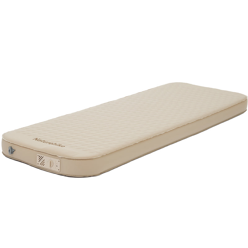 An automatic inflatable cushion with a beige outer surface and a visible brand label on one end.