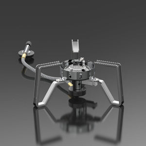 A silver portable gas stove with foldable stand and advanced wind-resistant technology, isolated on a grey background.