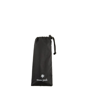 Snow Peak Folding Torch GT-120 included black nylon drawstring storage sack with logo, shown empty on white