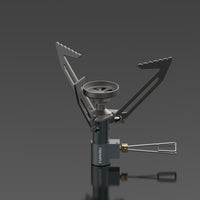 A Fire Maple Hornet Ⅱ Titanium Gas Stove with foldable legs and a small size, displayed against a dark background.