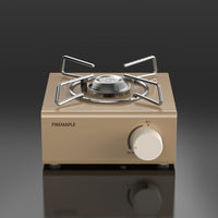 A compact Fire Maple butane gas stove with a stainless steel pot stand and a gold aluminum alloy body.