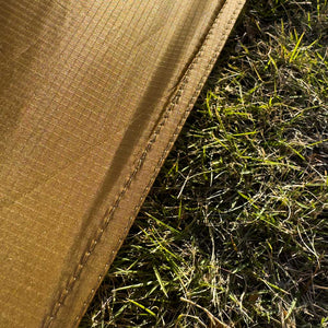 Close-up of the silicone-coated 20D fly fabric and taped hem