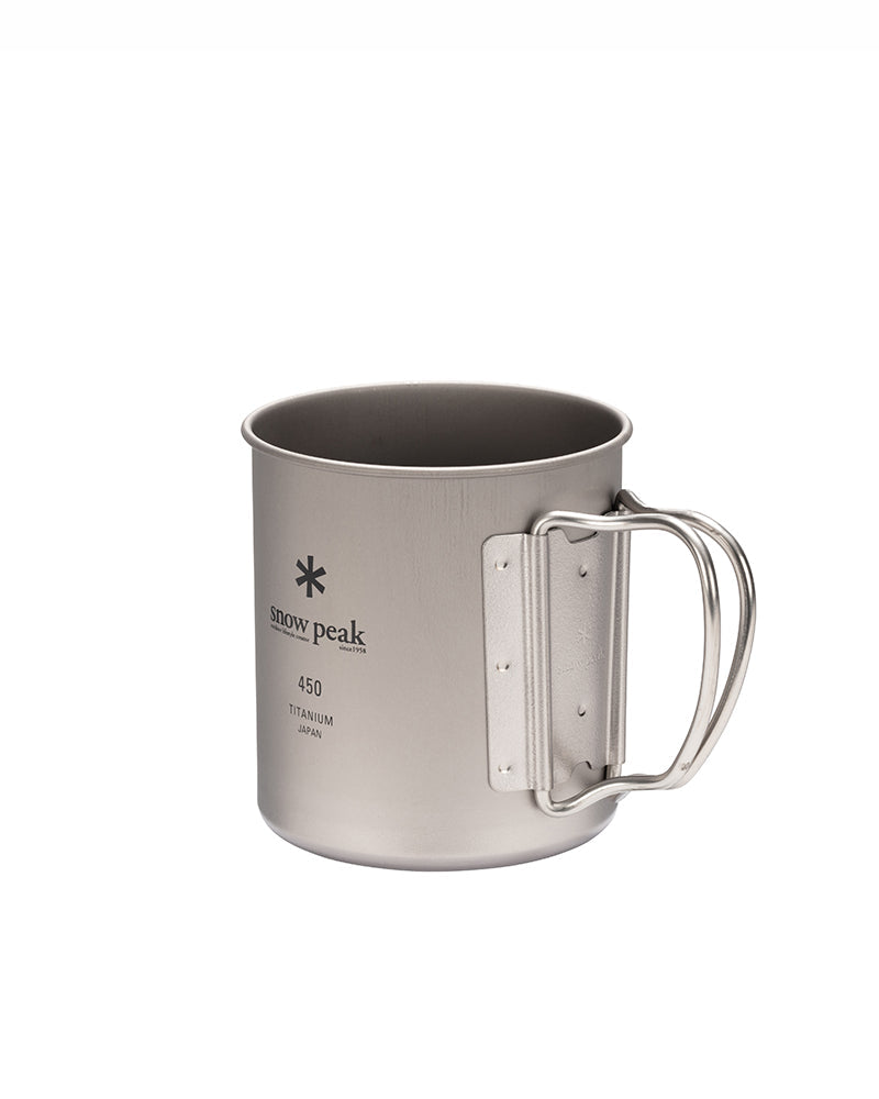 Snow Peak Ti-Single 450 titanium mug angled to show both wire folding handles extended from the riveted bracket