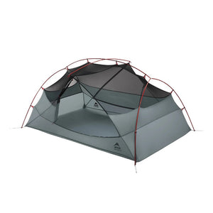 Gray camping tent with red accents on a white background