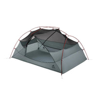 Gray camping tent with red accents on a white background