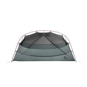 Green camping tent on a white background