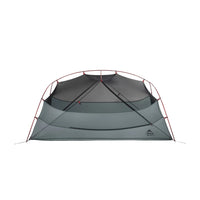 Green camping tent on a white background
