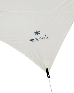 Snow Peak Takibi Tarp Hexa Set M ivory canopy close-up with the navy snow peak star logo and a black corner tab