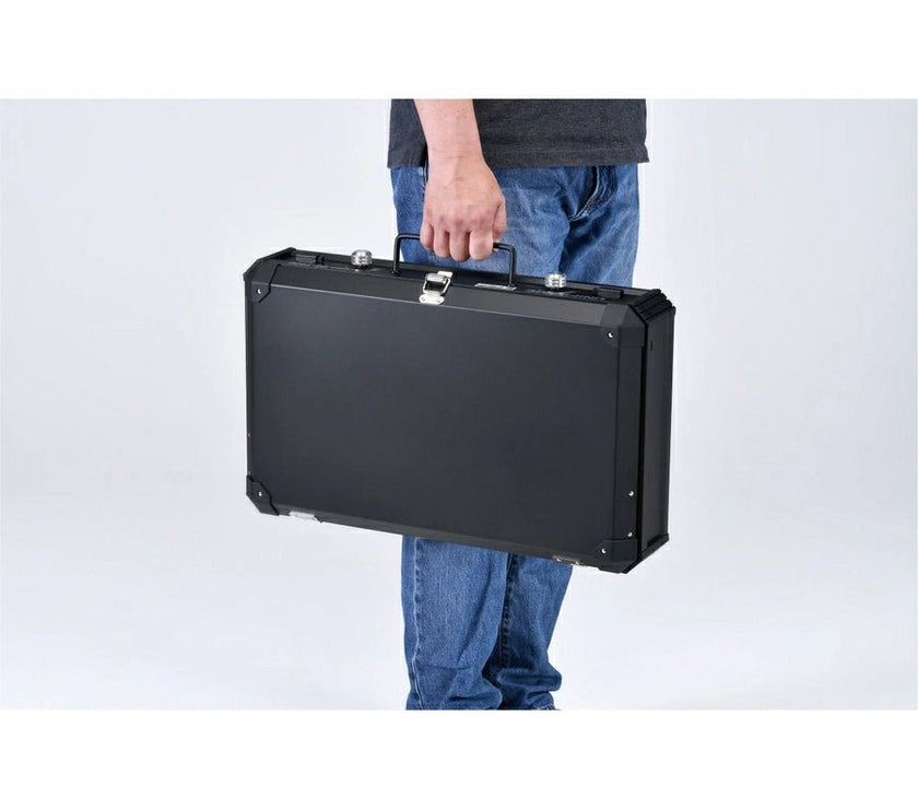 Uniflame Twin Burner US‑1900 folded flat with carry handle for compact storage